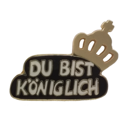 Königliches Abzeichen der Hofstaatsbox B mit Krone Schwarzes königliches Abzeichen aus der Hofstaatsbox B mit goldfarbener Krone und weißem Schriftzug „Du bist königlich“