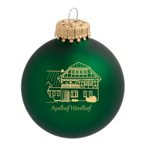 Hövelhof Apelhof Weihnachtskugel aus grünem Glas mit Hausmotiv Grüne Weihnachtskugel aus Glas mit goldfarbenem Druck eines Hauses und dem Schriftzug „Apelhof Hövelhof“, oben mit goldfarbener Aufhängung.
