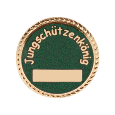 Abzeichen vergoldet ohne Befestigung Jungschützenkönig, rund mit grünem Hintergrund Rundes vergoldetes Abzeichen ohne Befestigung mit Schriftzug „Jungschützenkönig“, grünem Hintergrund und rechteckigem Gravurfeld unten