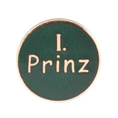 Abzeichen vergoldet mit langer Nadel 1. Prinz, rund mit grünem Hintergrund Rundes vergoldetes Abzeichen mit langer Nadel für den 1. Prinz im Schützenverein, mit grünem Hintergrund und Schriftzug „1. Prinz“