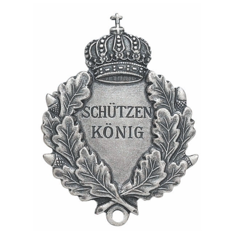 Königsabzeichen versilbert mit Krone und Eichenlaub Versilbertes Königsabzeichen mit Krone, Eichenlaubkranz und Schriftzug „Schützen König“, als Anhänger mit Öse und Sicherheitsnadel.