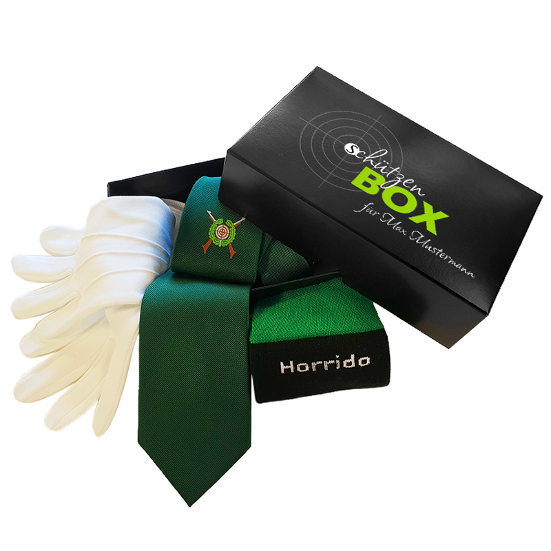 Schützenbox A mit schwarzer Geschenkbox, grüner Schützenkrawatte, weißen Handschuhen und Socken Schützenbox A mit schwarzer bedruckter Box, grüner Schützenkrawatte mit Schützenmotiv, einem Paar weiße Handschuhe und grünen Socken mit schwarzem Bündchen und Schriftzug